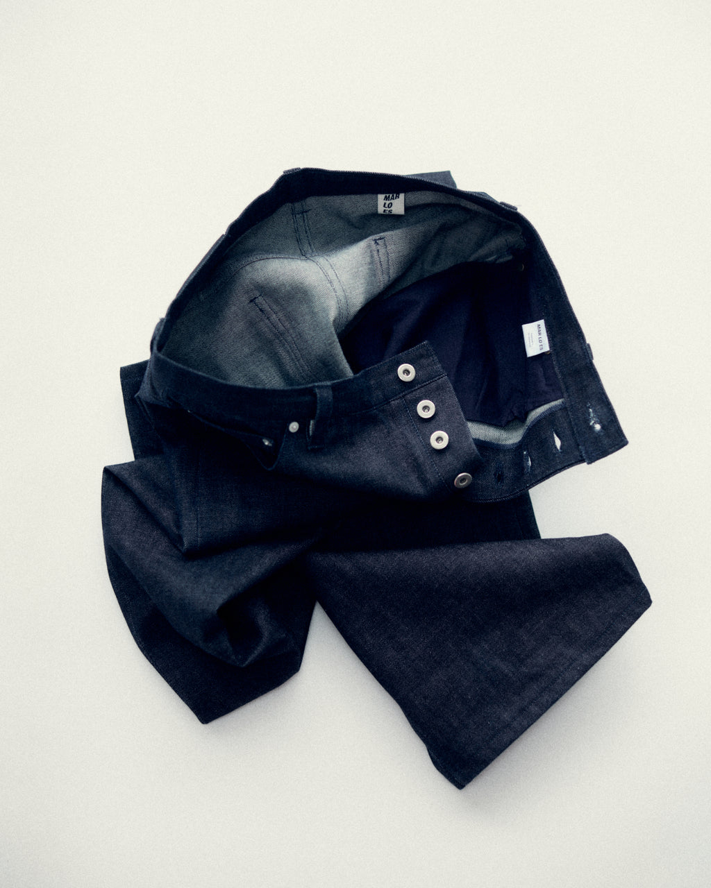 Dark denim Selvedge The Straight Jean on a light gray background